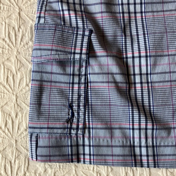 Plaid skort in blue black purple white and red with navy stretch shorts attached - Picture 5 of 13